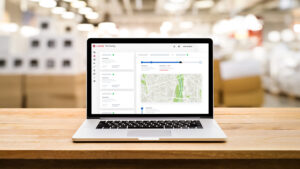 Laptop open on a desk with MySpot Shippers TMS application open ont he screen.