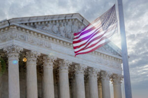 Front of Courthouse with US Flag Windblown